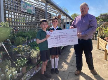 Sizzling Sausages raise £250 for school